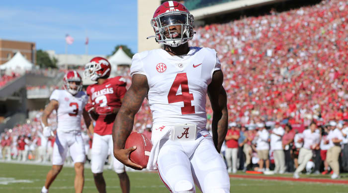 Alabama’s Jalen Milroe celebrates a touchdown vs. Arkansas.